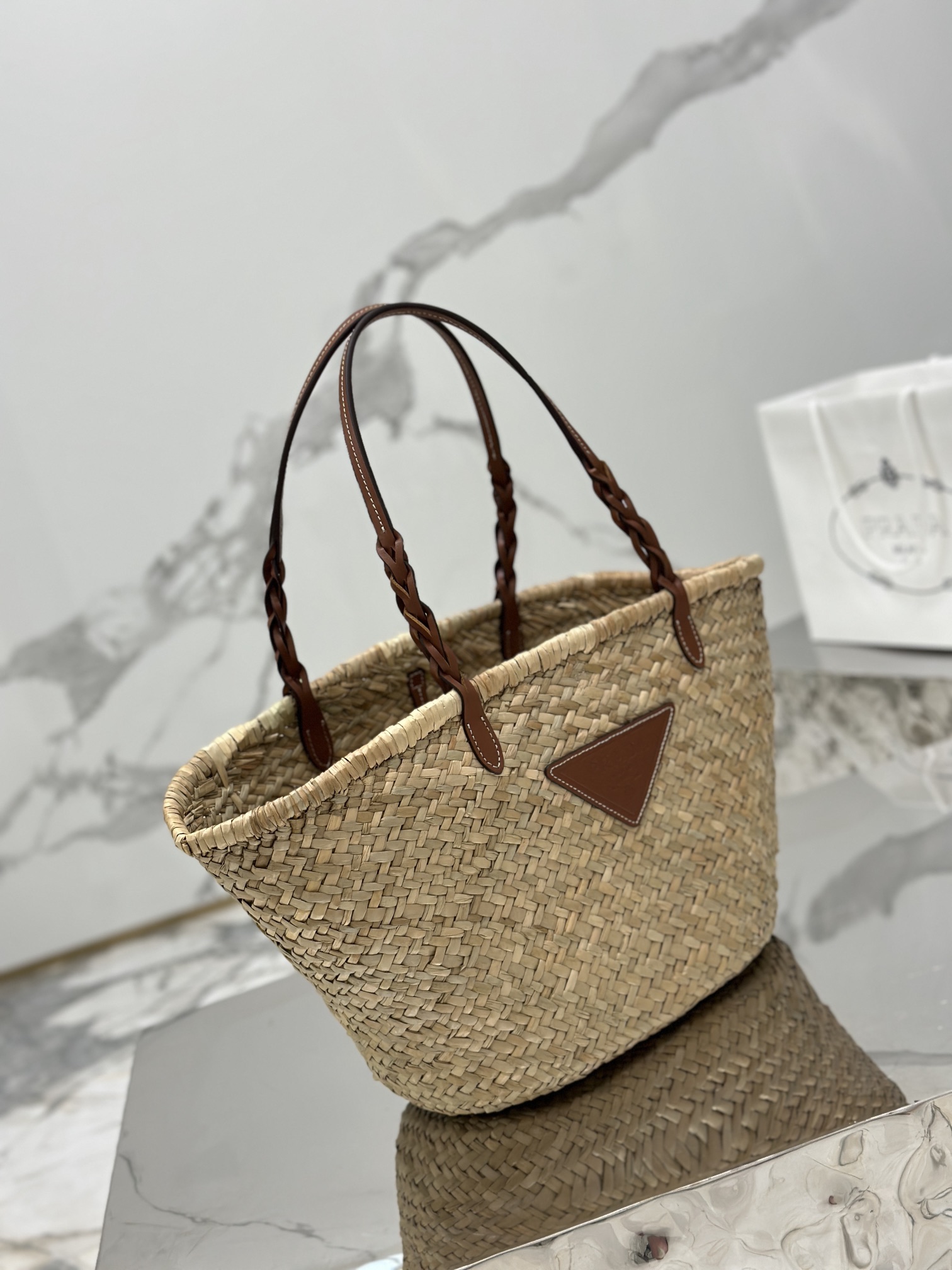 Pra*a woven palm and leather tote