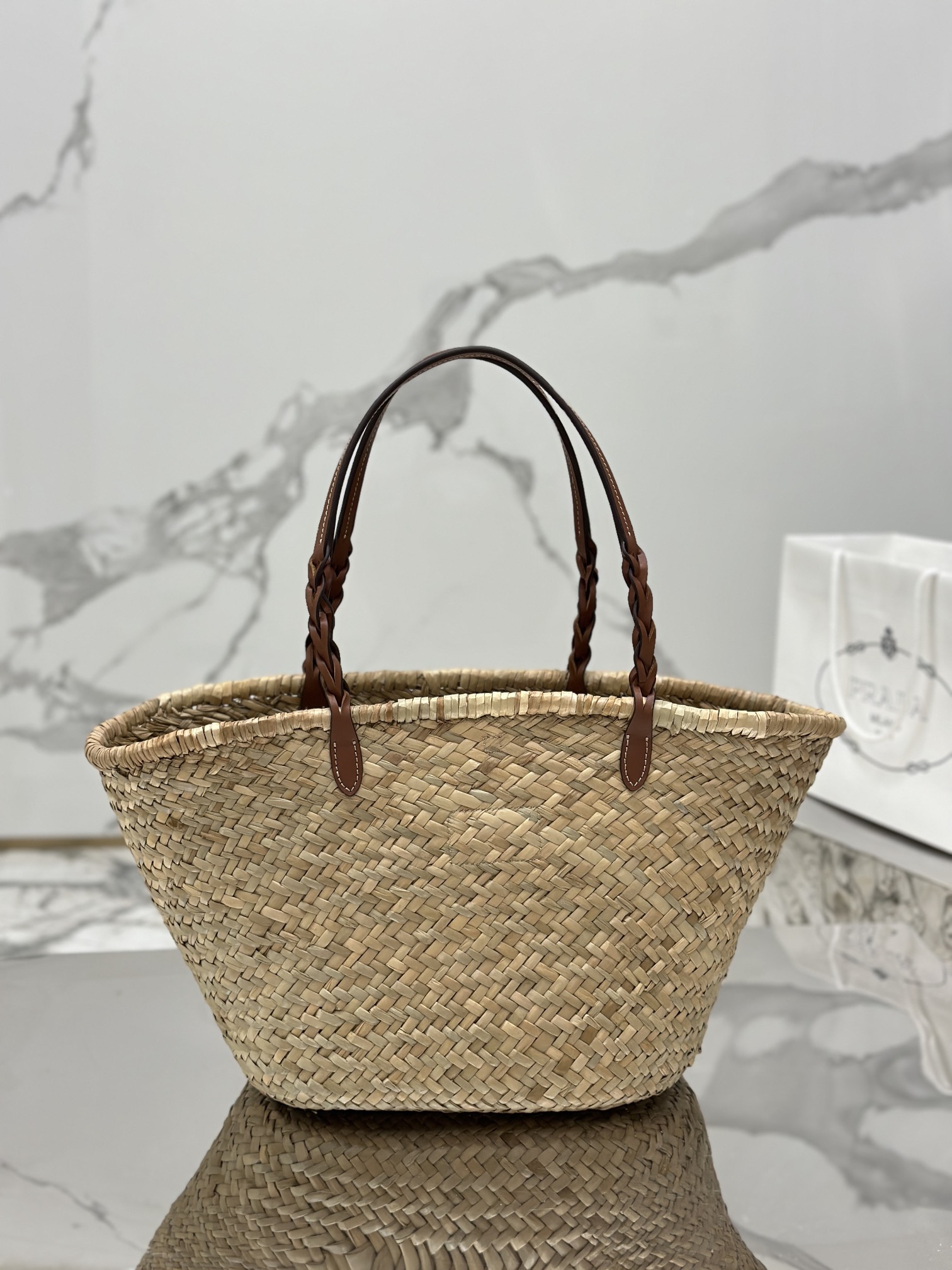 Pra*a woven palm and leather tote