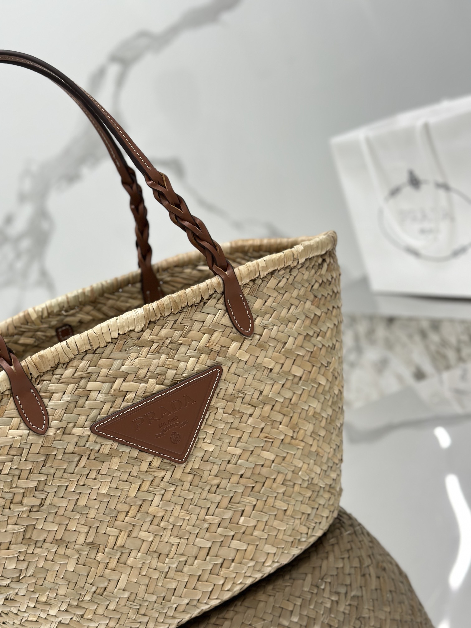 Pra*a woven palm and leather tote