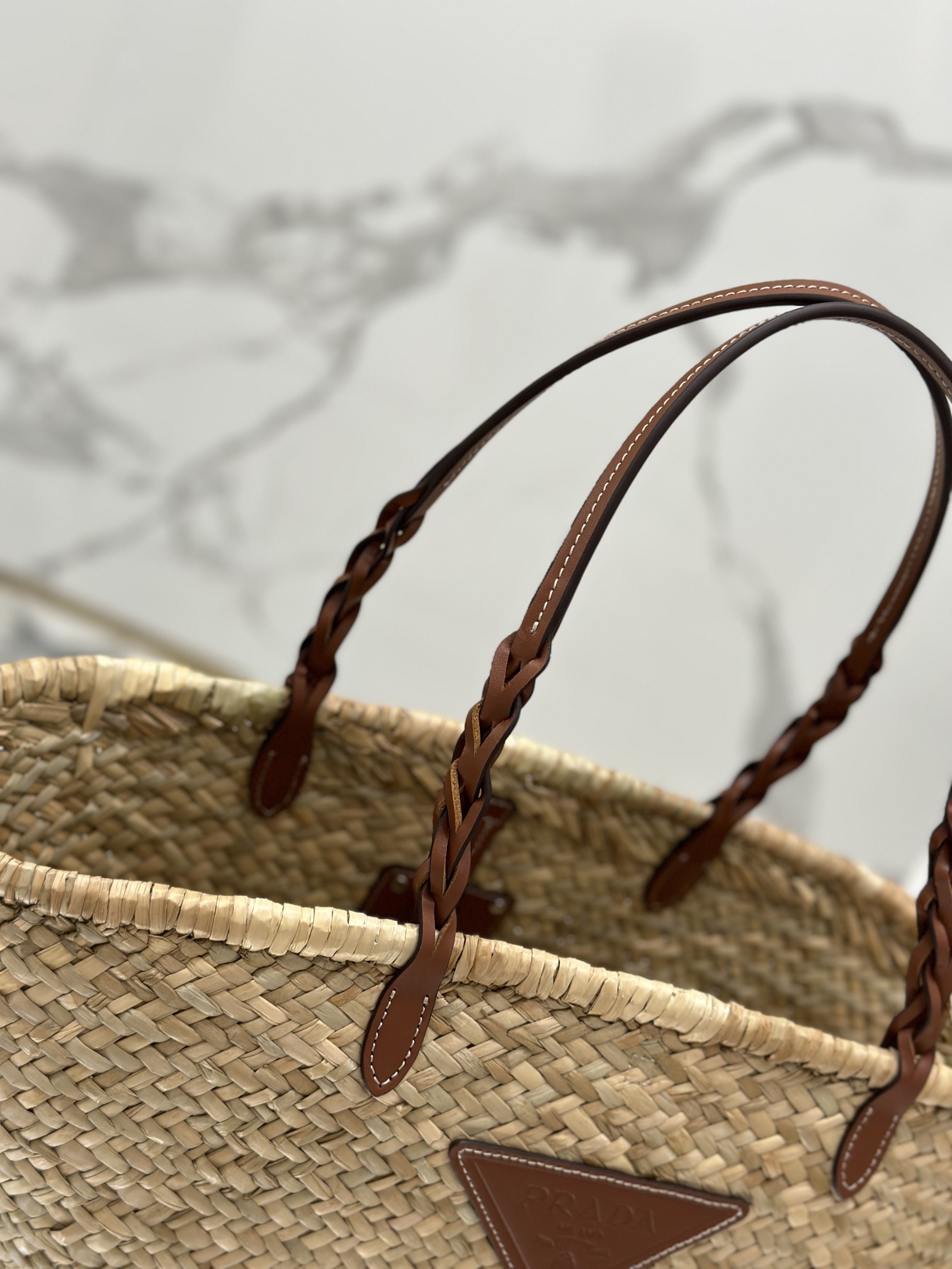 Pra*a woven palm and leather tote